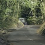 translucent tractor on a country road