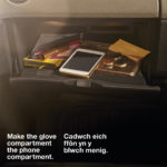 Make the glove compartment the phone compartment.