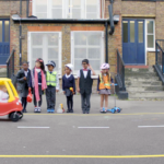 children crossing the road