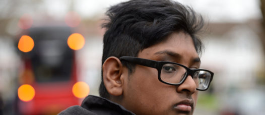 boy looking at the road