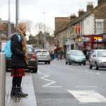 girl crossing the road