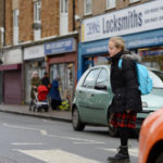 girl crossing the road