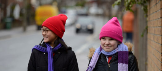 two girls smiling