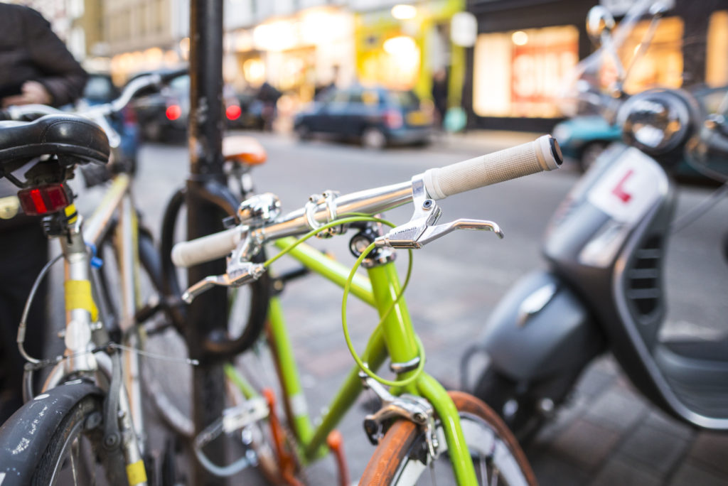 Bicycle locked on pavement