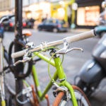 Bicycle locked on pavement